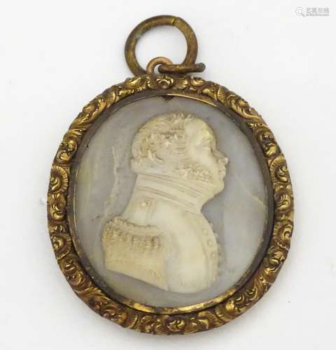 A 19thC oval cameo depicting a profile miniature portrait of a military gentleman in uniform.