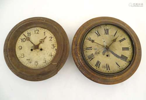 Two early-20thC circular wall clocks for restoration, each of oak and pine construction with steel