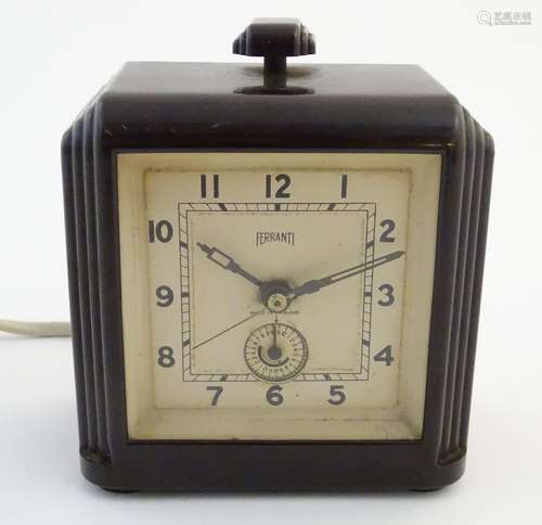 Clocks: an early-to-mid 20thC Art Deco electric alarm clock by Ferranti, England, with bakelite