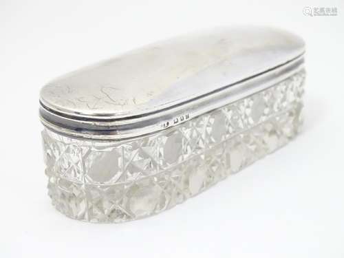 A cut glass dressing table pot with silver top hallmarked London 1919 maker JE. 4 1/4