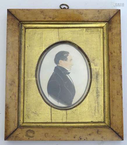 A 19thC oval watercolour and gouache portrait miniature / silhouette of a gentleman, Timothé