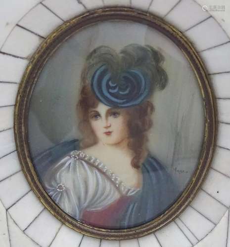 A Continental 20thC oval watercolour portrait miniature depicting a young lady with a flower in