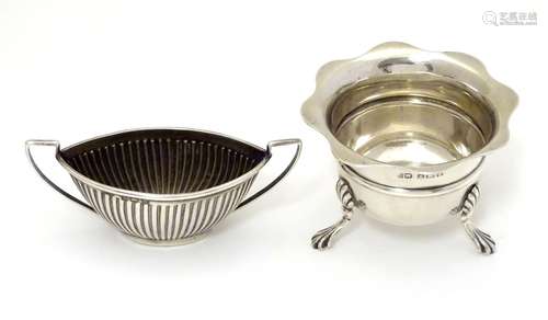 Two silver salts, one with twin handles, hallmarked Birmingham 1919, maker William Devenport. The