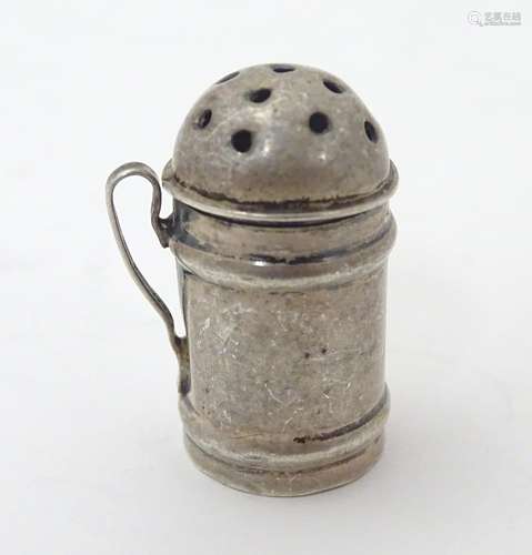 A Victorian novelty miniature pepperette formed as a flour shaker, hallmarked Birmingham 1894, maker