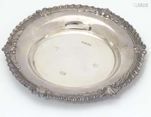 A silver wine coaster hallmarked Birmingham 1973, maker Marston & Co. Approx. 5 1/4