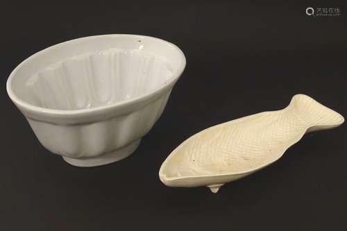 A Leedsware Classical Creamware jelly / mousse mould raised on three feet in the form of a fish,