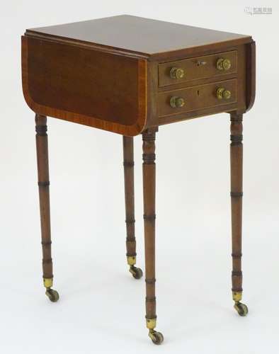 A late 18thC / early 19thC mahogany pembroke style work table with crossbanded top and drop flaps,