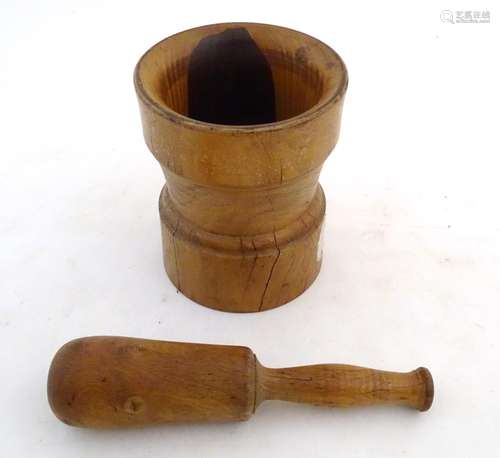 Kitchenalia: a continental 19thC Treen turned elm pestle and mortar, measuring 9 3/4