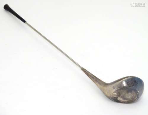 A vintage novelty silver plate swizzle stick / cocktail stirrer formed as a gold club. Marked