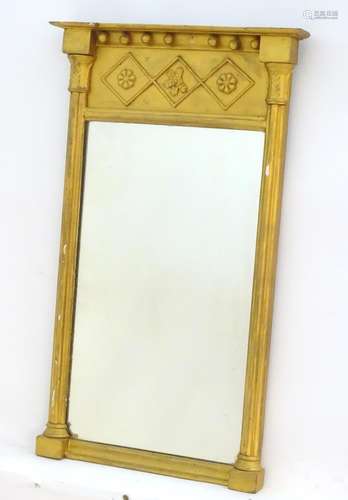 A 19thC pier mirror with a moulded cornice above applied beadwork and rosettes, the mirror flanked