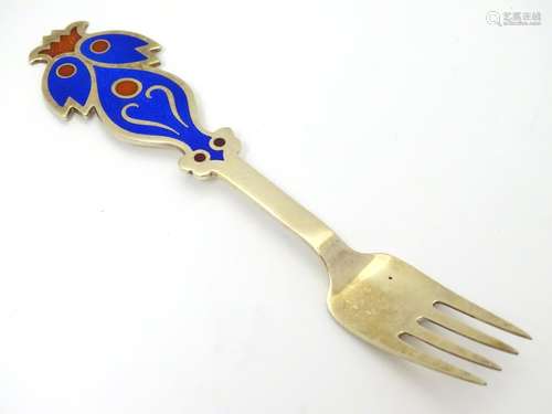 A Danish sterling silver gilt and enamel 1974 Christmas fork with The Bluebird design. Maker A.