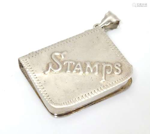 A .925 silver pendant stamp case. 1 1/2