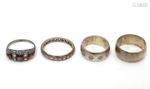 4 assorted rings including 3 silver examples (4) Please Note - we do not make reference to the