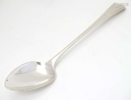 A Geo III Old English pattern silver serving spoon hallmarked London 1808 maker Peter & William