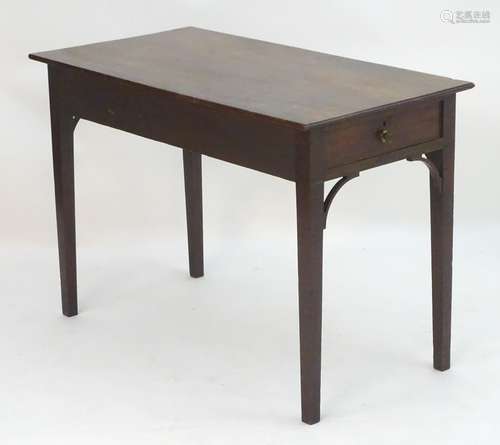 An 18thC mahogany side table with a single end drawer above a rectangular top and having brackets to