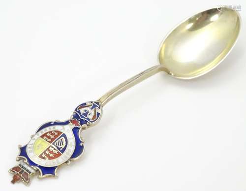 A Victorian silver gilt souvenir spoon with enamel decoration depicting shield and motto Honi soit