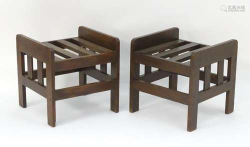 A pair of early 20thC oak luggage racks, bearing bone plaque 'Joscelyne's LTD. Johannesburg'. 18''