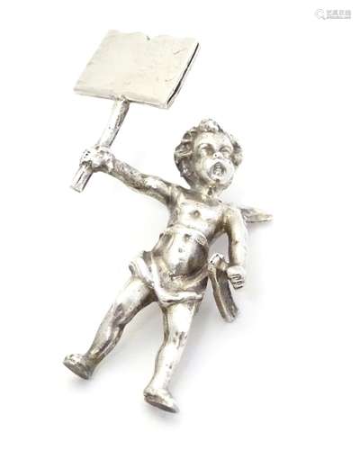 A white metal menu / table place card holder formed as a cherub. Approx 1 1/2