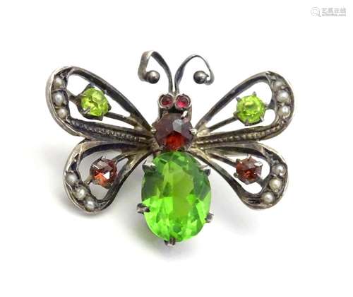 A silver late 19th / early 20thC brooch / clasp formed as a butterfly with articulated wings and set