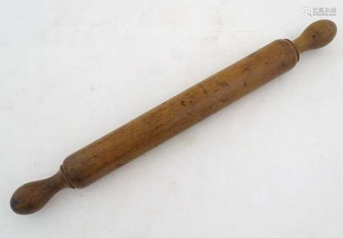 Kitchenalia: an early 20thC Treen turned beech rolling pin, with knop handles, 19 1/4