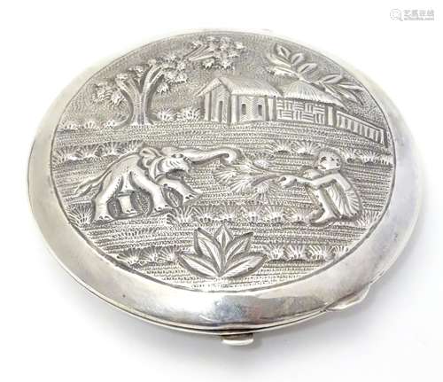 A Sterling silver compact depicting figure and elephant etc. possibly Indian. 3