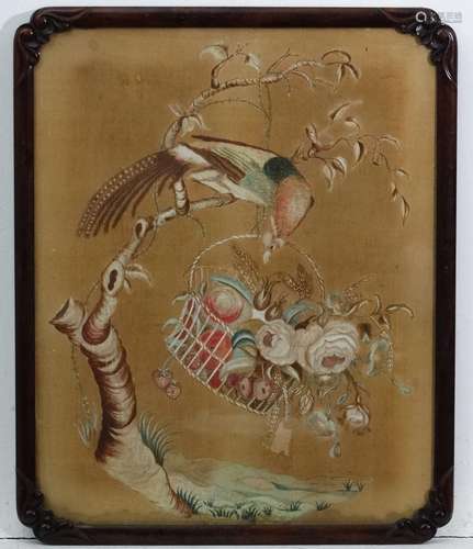 A Chinese mid 19thC watercolour on silk depicting a pheasant on a perch reaching into a basket of