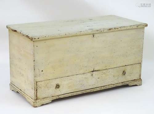 A Georgian pine blanket box / mule chest with a painted exterior, carrying handles and a single long