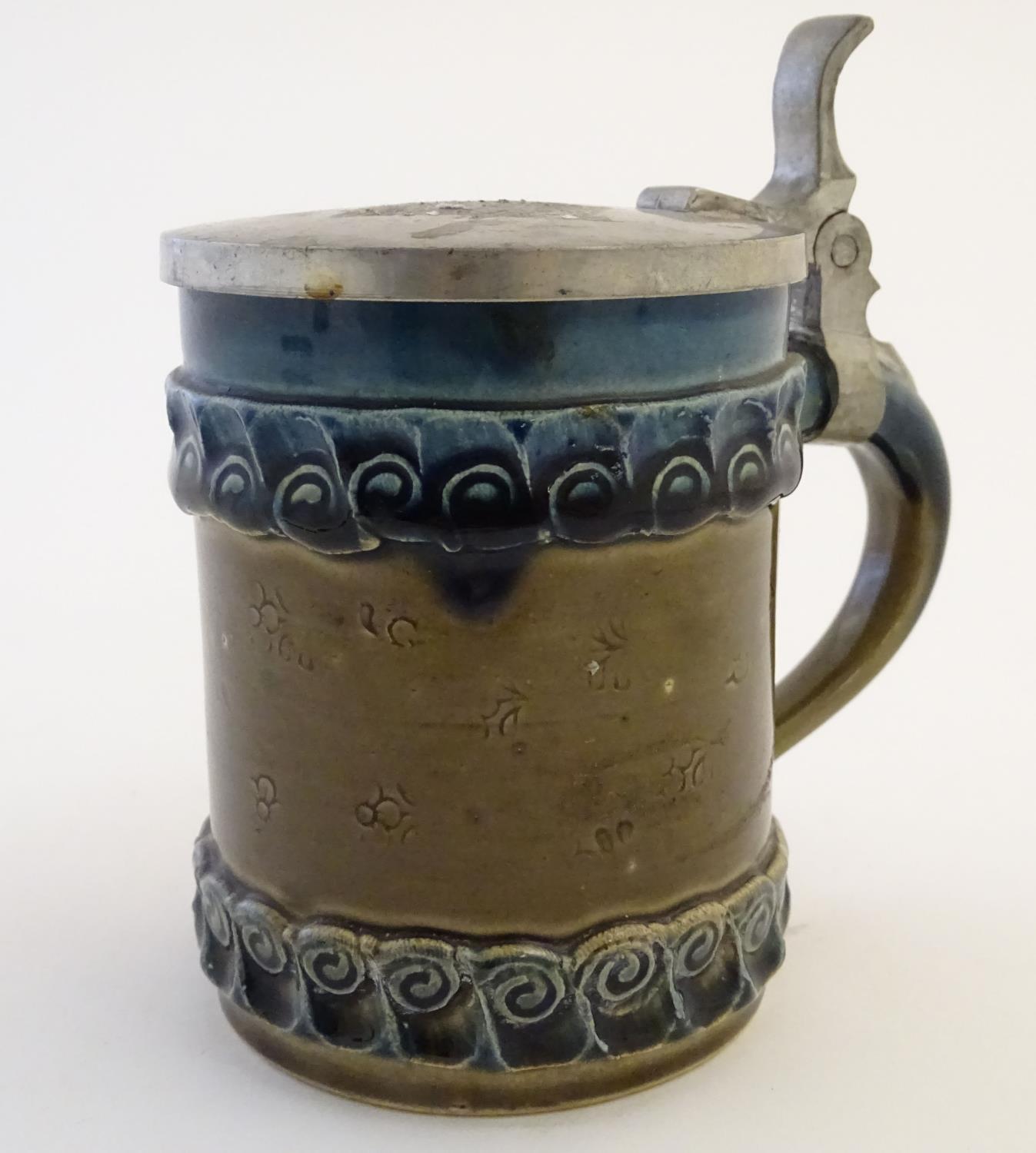 A Rosenthal tankard / beer stein with incised flower decoration to 