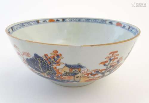 An oriental bowl decorated with landscape scenes and figures in the Imari palette. Approx. 3 1/4