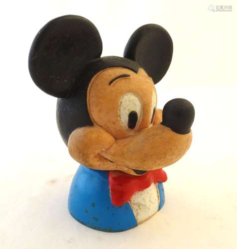 A 20thC money box modelled as Mickey Mouse. Approx. 7 1/2