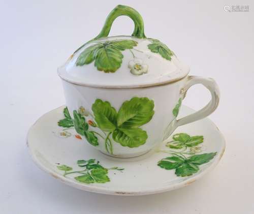 A 19thC Minton chocolate cup / lidded cup and saucer with moulded relief decoration in the pattern