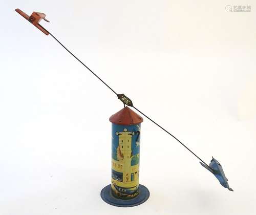 Toys: An early 20thC tin plate Tower Aeroplane / airplane by Louis Marx & Co. Approx. 8 1/2