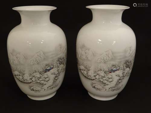 A pair of Chinese baluster vases with flared rims, with transfer decoration depicting winter