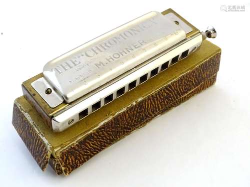 Musical Instrument: a boxed mid-20thC 'Chromonica' harmonica mouth organ by M. Hohner, Germany.