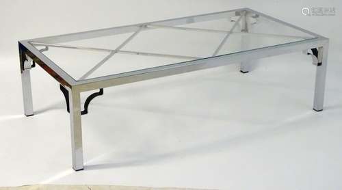 Vintage Retro mid Century modern: A large chromed and glass topped coffee table with cross