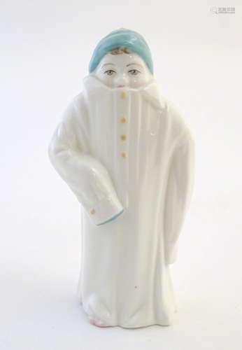 A Royal Worcester figural candle snuffer modelled as Toddie from Helen's Babies at Play by John