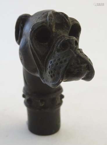 A cast bronze walking stick handle formed as the head of a boxer dog. Approx. 2 3/4