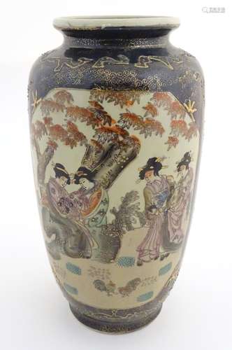 A Japanese vase with panelled decoration depicting figures in a landscape with chickens. Approx.