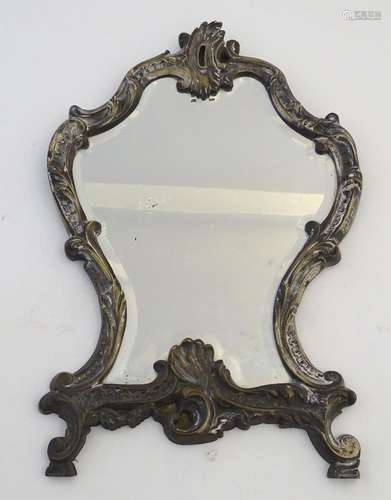 A late 19thC cast brass mirror with acanthus and C scroll decoration. Approx. 17 1/4