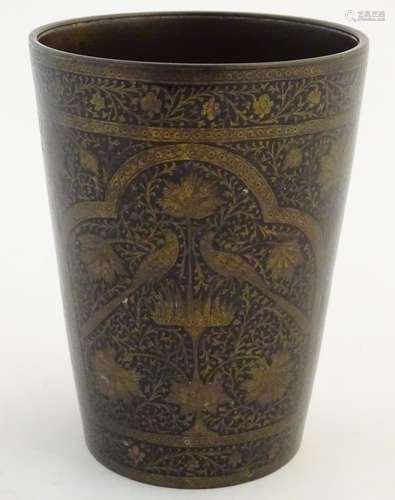 A 19thC Indian bronze and black enamel lassi cup / beaker with scrolling floral and foliate