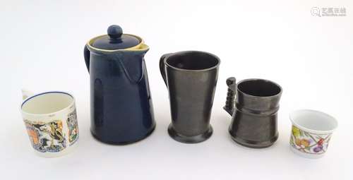 A quantity of assorted ceramics to include a Denby coffee pot, two Prinknash Abbey tankards, a