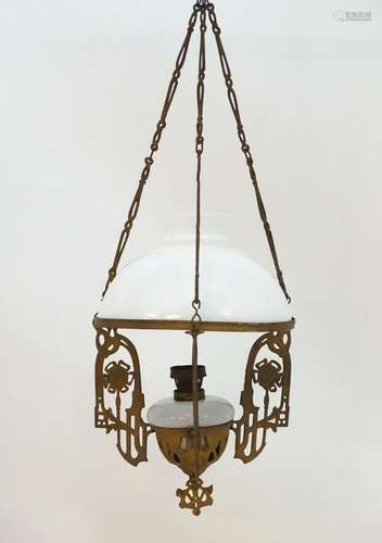 Lighting: a French Art Nouveau pendant oil lamp, with milk glass shade and reservoir, supported by a