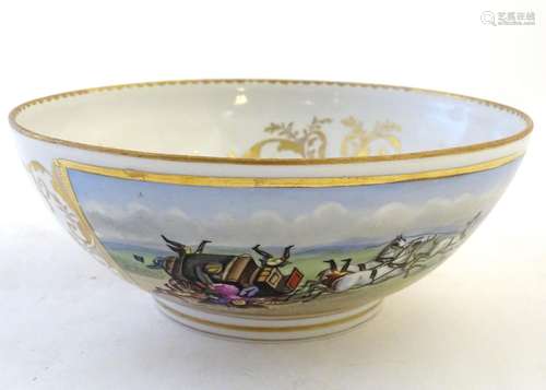 An English 19thC porcelain bowl with hand painted coaching scenes within scrolling gilt borders.