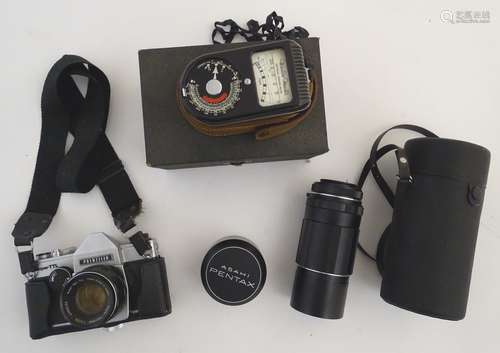 A mid-20thC film camera photographic kit, comprising Prinzflex SLR camera, super-Takuma telephoto