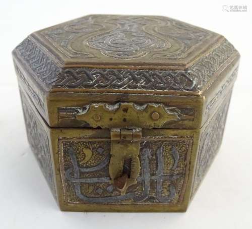 A Persian cedar lined table spice box of hexagonal form, with inlaid white metal and copper