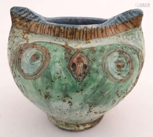 A studio pottery vase formed as the head of an owl. Approx. 5 3/4