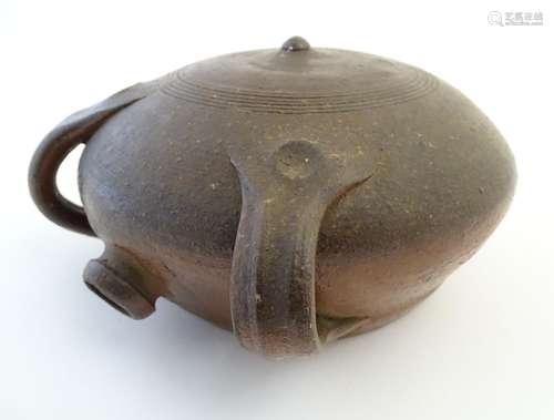 A studio pottery drinking vessel formed as a flattened amphora of the Middle Ages, of circular