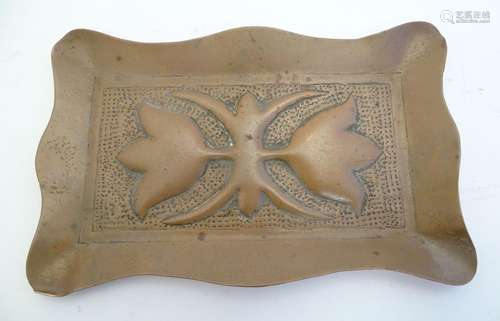 An early 20thC rectangular copper pin dish with a lobed rim and embossed Art Nouveau decoration.