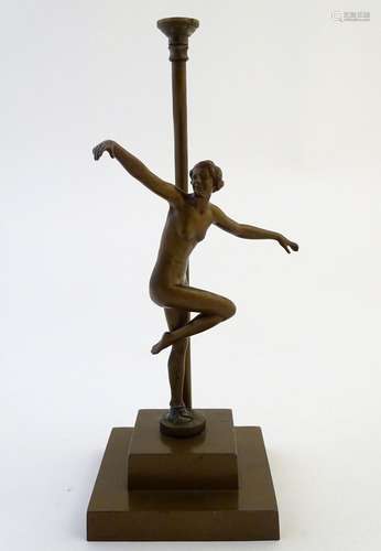 Lighting: an Art Deco brass table lamp, decorated with a figurine and standing on a stepped base. 13