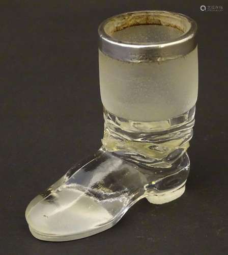 Glass: an early 20thC novelty glass novelty Vesta formed as a boot, with hallmarked silver rim